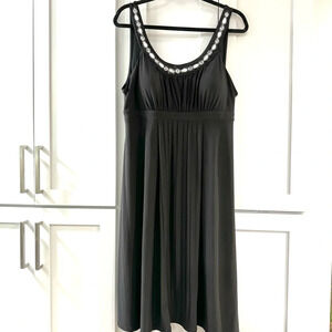 Black empire waist little black dress with rhinestone and chain embellishment